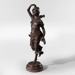 A French bronze on a rouge marble base, c1873