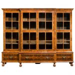Peeps style breakfront four door bookcase of small proportions.
