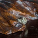 antique snail wood base