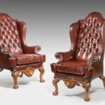 pair of leather antique chairs