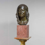 bronze women's face statue