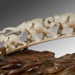 A Japanese ivory tusk carving of a group of elephants | Wick Antiques