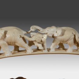 A Japanese ivory tusk carving of a group of elephants | Wick Antiques