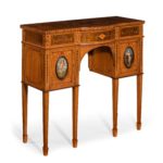 A Victorian satinwood console table attributed to Wright and Mansfield