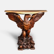 A rare Black Forest console table in the form of an eagle with marble top, circa 1890