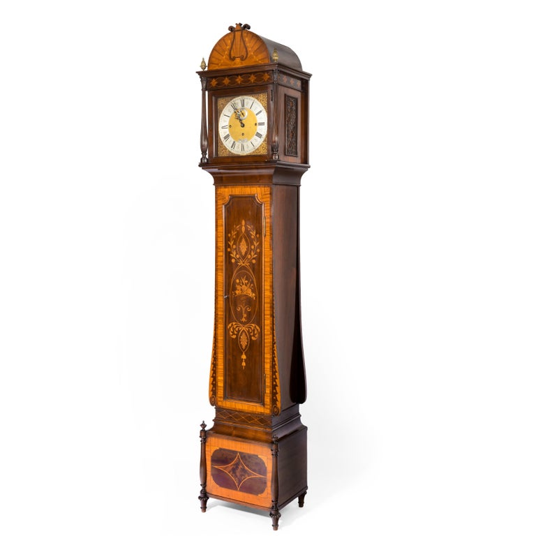 An unusual flame mahogany long-case clock attributed to Maples