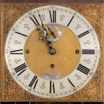 An unusual flame mahogany long-case clock attributed to Maples