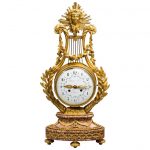 A Napoleon III Lyre clock with ormolu hands
