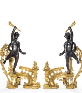 A pair of late 19th century ormolu and bronze chenets