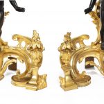 A pair of late 19th century ormolu and bronze chenets close up