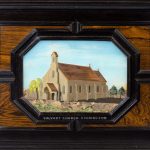 A fine quality ebony bijouterie table cabinet showing Cavalry Church, Stonington, Long Island painting