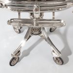 A large silver plate carving trolley or roast beef trolley by Erguis legs and wheels
