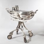 A large silver plate carving trolley or roast beef trolley by Erguis side