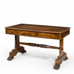 A late Regency rosewood free standing library table, by James Winter, side view
