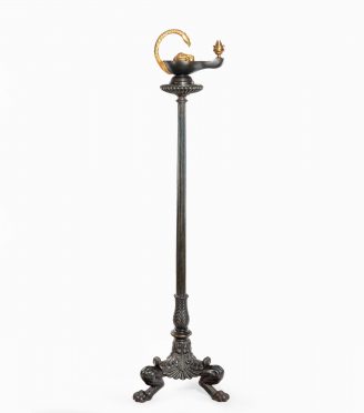 A cast iron colza style standard lamp