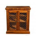 A late Regency Gonçalo Alves two-door side cabinet attributed to Gillows