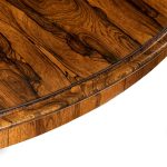 A Regency rosewood five-foot tilt-top centre table