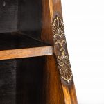 A pair of high Regency coromandel and ormolu bookcase console tables