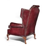 A Generous Leather Wing arm chair side