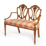 A late Victorian Sheraton revival painted satinwood two-seater settee front facing