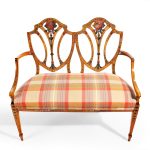 A late Victorian Sheraton revival painted satinwood two-seater settee front facing