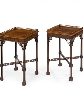 A pair of mahogany side tables in the Chippendale style