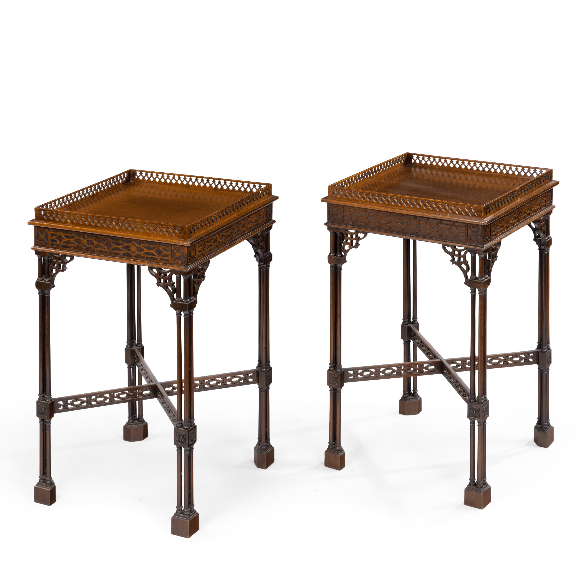 A pair of mahogany side tables in the Chippendale style