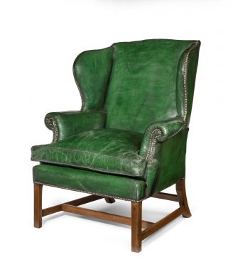 generous George III mahogany wing arm chair