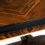 A stylish Art Deco zebra wood centre or dining table close up