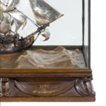 A silver and wood model of HMS Victory by H Wyllie