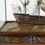 A silver and wood model of HMS Victory by H Wyllie