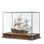 A silver and wood model of HMS Victory by H Wylie,