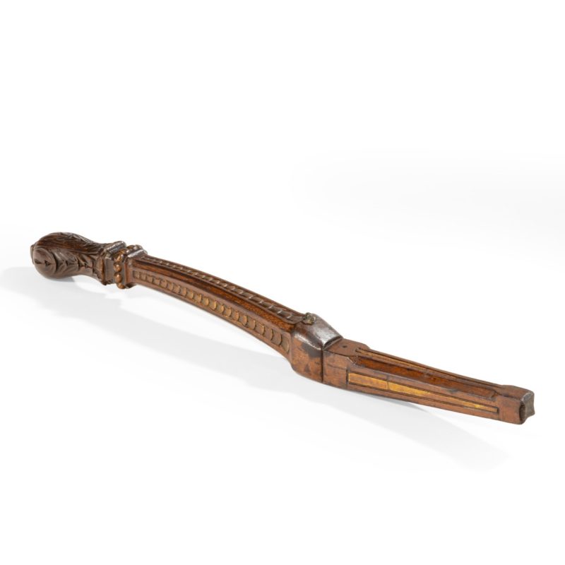 A parcel gilt walnut tiller, possibly from an officer’s rowing gig