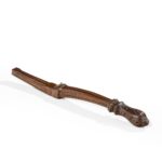 A parcel gilt walnut tiller, possibly from an officer’s rowing gig