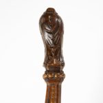 A parcel gilt walnut tiller, possibly from an officer’s rowing gig grip