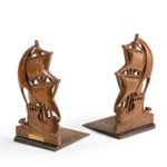 A pair of teak book ends from H MS Iron Duke