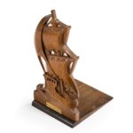 A pair of teak book ends from H MS Iron Duke
