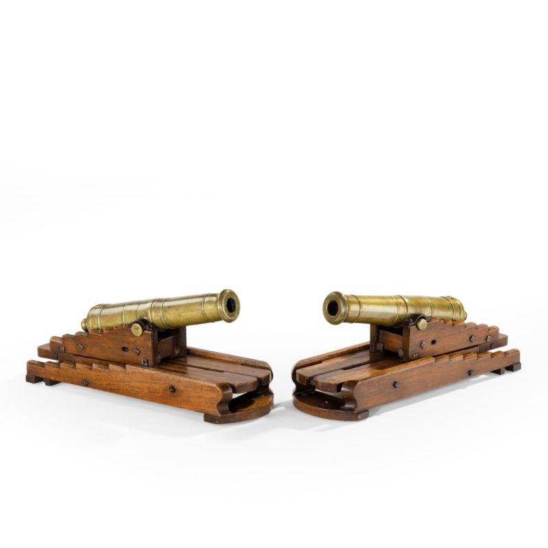 pair of brass 19th century models of ship’s 32-pounder cannon