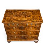 A William and Mary marquetry walnut veneered chest of drawers