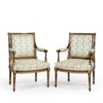 A pair of rosewood Louis XVI style open armchairs