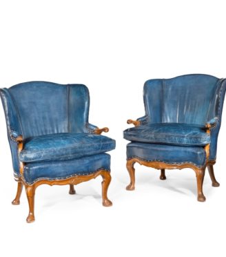 A pair of very generous mahogany wing armchairs attributed to Whytock and Reid, Edinburgh