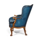 A pair of very generous mahogany wing armchairs attributed to Whytock and Reid profile