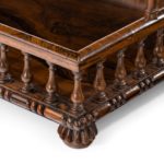 A Regency rosewood book tray attributed to Gillows corner