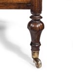 A Regency rosewood Canterbury in the manner of Loudon leg detail