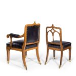 A set of six Gothic oak dining chairs leg 2