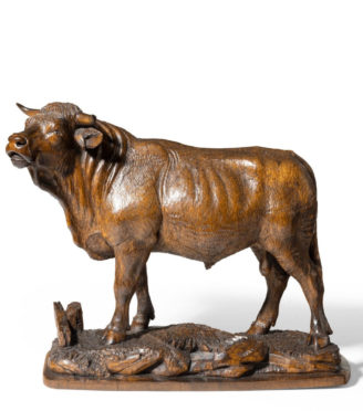 A fine 'Black Forest' linden wood model of a standing bull, Swiss, c1890.