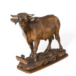 A fine 'Black Forest' linden wood model of a standing bull 3