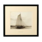 Early silver gelatin photograph print on the Gaff rigged yacht Wayward sailing on port tack with Cowes in the background by Beken of Cowes. Signed and Dated 1902.