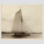 Early silver gelatin photograph print on the Gaff rigged yacht Wayward sailing on port tack with Cowes in the background by Beken of Cowes