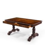 A William IV rosewood partners’ library table open